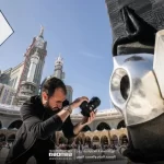 Behind-the-scenes of Shoayb photographing the Black Stone inside an empty Kaaba sanctuary during a rare architectural and fine art project