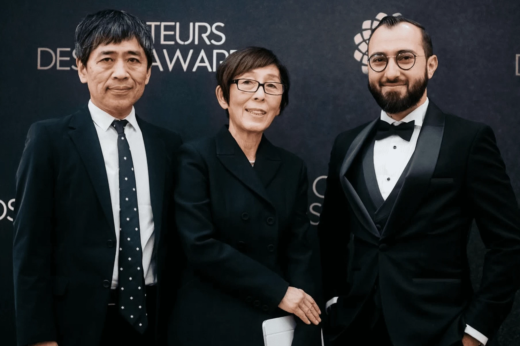 Shoayb standing with SANAA architects at the Creatures Design Awards ceremony in Paris